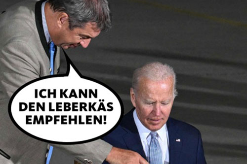 Satirische Fotomontage: Joe Biden sitzt vor dem Gästebuch beim G7-Gipfel, Markus Söder zeigt auf das Buch und sagt "Ich kann den Leberkäs empfehlen!" | Bildquelle: AFP | Montage: WDR (Heimer)